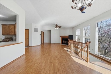 Enjoy a lake view setting paired with a flexible floor plan full on Bella Vista Country Club - Scottsdale in Arkansas - for sale on GolfHomes.com, golf home, golf lot