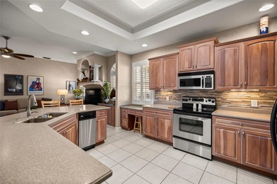 Welcome to this Entertainer's Dream Property overlooking the on Ocala Palms Golf and Country Club in Florida - for sale on GolfHomes.com, golf home, golf lot