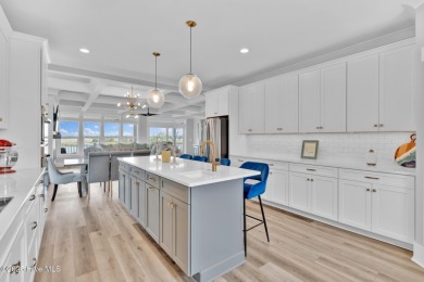 Experience luxury coastal living at its finest on Oak Island's on Founders Club At St. James Plantation in North Carolina - for sale on GolfHomes.com, golf home, golf lot