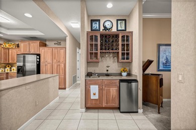 Welcome to this Entertainer's Dream Property overlooking the on Ocala Palms Golf and Country Club in Florida - for sale on GolfHomes.com, golf home, golf lot