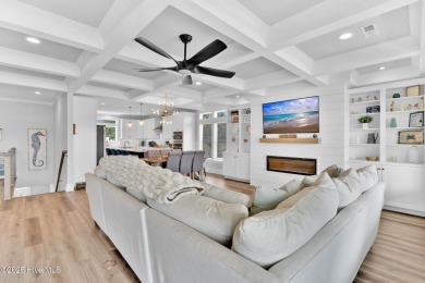 Experience luxury coastal living at its finest on Oak Island's on Founders Club At St. James Plantation in North Carolina - for sale on GolfHomes.com, golf home, golf lot