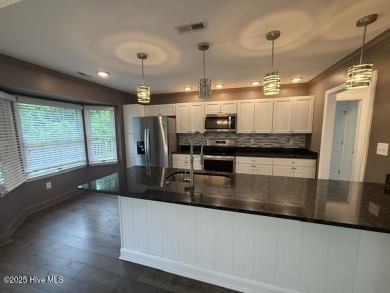 Looking for charm, comfort & convenience all in one? Welcome to on Harbour Point Golf Club in North Carolina - for sale on GolfHomes.com, golf home, golf lot