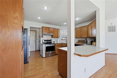 Enjoy a lake view setting paired with a flexible floor plan full on Bella Vista Country Club - Scottsdale in Arkansas - for sale on GolfHomes.com, golf home, golf lot