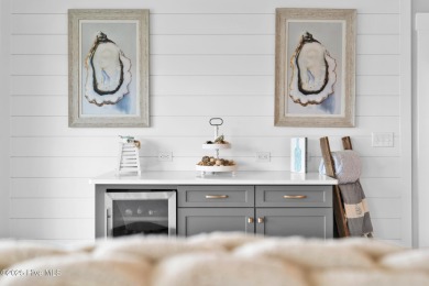 Experience luxury coastal living at its finest on Oak Island's on Founders Club At St. James Plantation in North Carolina - for sale on GolfHomes.com, golf home, golf lot