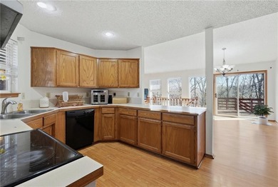 Enjoy a lake view setting paired with a flexible floor plan full on Bella Vista Country Club - Scottsdale in Arkansas - for sale on GolfHomes.com, golf home, golf lot