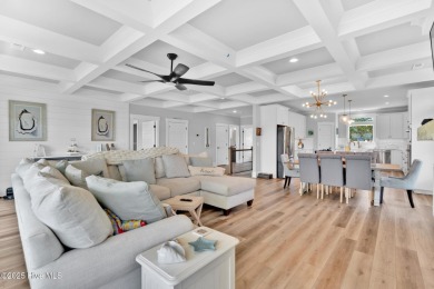 Experience luxury coastal living at its finest on Oak Island's on Founders Club At St. James Plantation in North Carolina - for sale on GolfHomes.com, golf home, golf lot