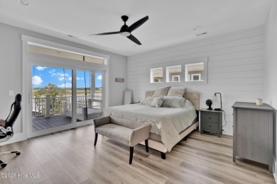 Experience luxury coastal living at its finest on Oak Island's on Founders Club At St. James Plantation in North Carolina - for sale on GolfHomes.com, golf home, golf lot