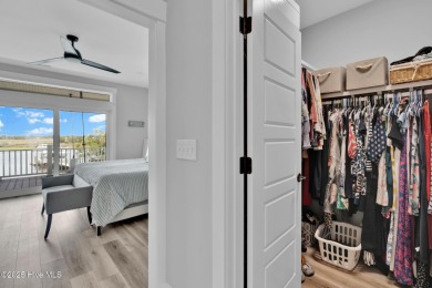 Experience luxury coastal living at its finest on Oak Island's on Founders Club At St. James Plantation in North Carolina - for sale on GolfHomes.com, golf home, golf lot