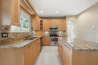 Experience golf course living at its finest on the 7th fairway on Country Club of Mount Dora in Florida - for sale on GolfHomes.com, golf home, golf lot