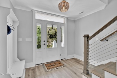 Experience luxury coastal living at its finest on Oak Island's on Founders Club At St. James Plantation in North Carolina - for sale on GolfHomes.com, golf home, golf lot