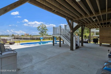 Experience luxury coastal living at its finest on Oak Island's on Founders Club At St. James Plantation in North Carolina - for sale on GolfHomes.com, golf home, golf lot