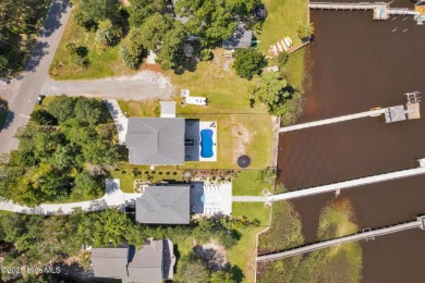 Experience luxury coastal living at its finest on Oak Island's on Founders Club At St. James Plantation in North Carolina - for sale on GolfHomes.com, golf home, golf lot