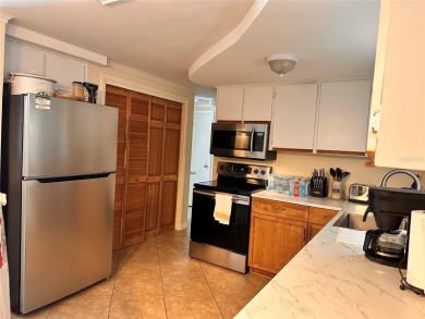 Discover move-in-ready convenience in this charming 2-bedroom on Beacon Woods Golf Club in Florida - for sale on GolfHomes.com, golf home, golf lot