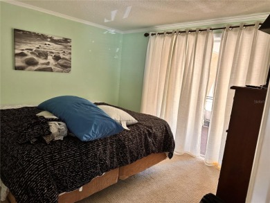 Discover move-in-ready convenience in this charming 2-bedroom on Beacon Woods Golf Club in Florida - for sale on GolfHomes.com, golf home, golf lot
