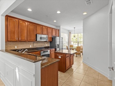 Rare End-Unit Townhome in Gated Bella Trae - Resort-Style Living on ChampionsGate Golf Resort in Florida - for sale on GolfHomes.com, golf home, golf lot
