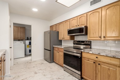 Truly move-in ready and beautifully renovated with stunning on PalmBrook Country Club in Arizona - for sale on GolfHomes.com, golf home, golf lot