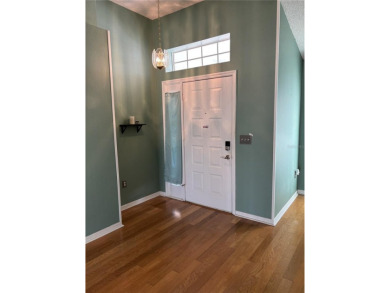 Welcome to a lovely home situated on a large corner lot in the on Caloosa Greens Executive Golf Course in Florida - for sale on GolfHomes.com, golf home, golf lot