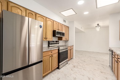 Truly move-in ready and beautifully renovated with stunning on PalmBrook Country Club in Arizona - for sale on GolfHomes.com, golf home, golf lot