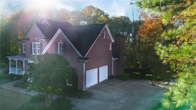 Situated on a serene cul-de-sac street within Woodmont Golf and on Woodmont Golf and Country Club in Georgia - for sale on GolfHomes.com, golf home, golf lot