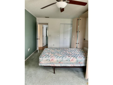 Welcome to a lovely home situated on a large corner lot in the on Caloosa Greens Executive Golf Course in Florida - for sale on GolfHomes.com, golf home, golf lot