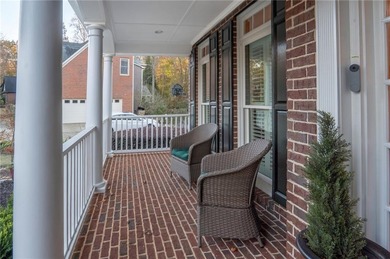 Situated on a serene cul-de-sac street within Woodmont Golf and on Woodmont Golf and Country Club in Georgia - for sale on GolfHomes.com, golf home, golf lot