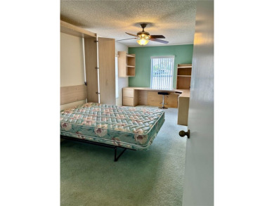 Welcome to a lovely home situated on a large corner lot in the on Caloosa Greens Executive Golf Course in Florida - for sale on GolfHomes.com, golf home, golf lot