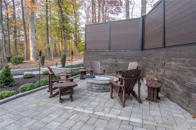 Situated on a serene cul-de-sac street within Woodmont Golf and on Woodmont Golf and Country Club in Georgia - for sale on GolfHomes.com, golf home, golf lot