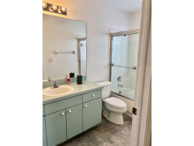 Welcome to a lovely home situated on a large corner lot in the on Caloosa Greens Executive Golf Course in Florida - for sale on GolfHomes.com, golf home, golf lot