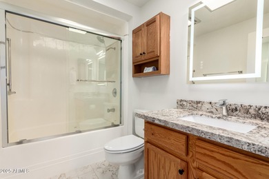 Truly move-in ready and beautifully renovated with stunning on PalmBrook Country Club in Arizona - for sale on GolfHomes.com, golf home, golf lot