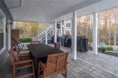 Situated on a serene cul-de-sac street within Woodmont Golf and on Woodmont Golf and Country Club in Georgia - for sale on GolfHomes.com, golf home, golf lot