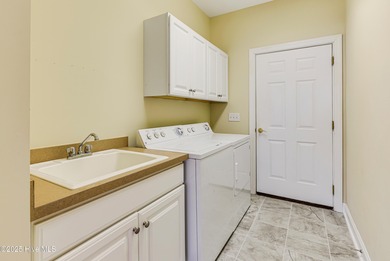 Welcome home to 602 Bermuda Walk within Sea Trail Plantation in on Sea Trail Golf Resort in North Carolina - for sale on GolfHomes.com, golf home, golf lot