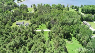 Lot available on Pine Ridge Road! Build your dream home on this on Indian Lake Golf and Country Club in Michigan - for sale on GolfHomes.com, golf home, golf lot