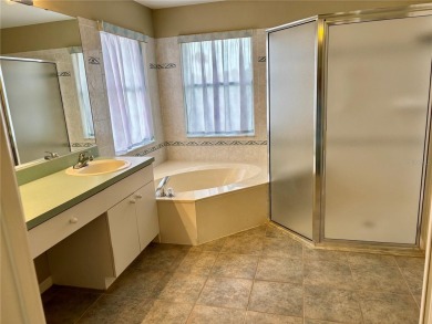 Welcome to a lovely home situated on a large corner lot in the on Caloosa Greens Executive Golf Course in Florida - for sale on GolfHomes.com, golf home, golf lot