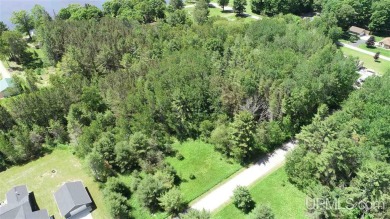 Lot available on Pine Ridge Road! Build your dream home on this on Indian Lake Golf and Country Club in Michigan - for sale on GolfHomes.com, golf home, golf lot