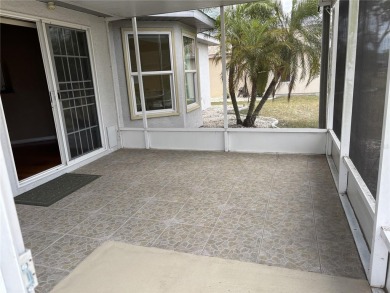 Welcome to a lovely home situated on a large corner lot in the on Caloosa Greens Executive Golf Course in Florida - for sale on GolfHomes.com, golf home, golf lot
