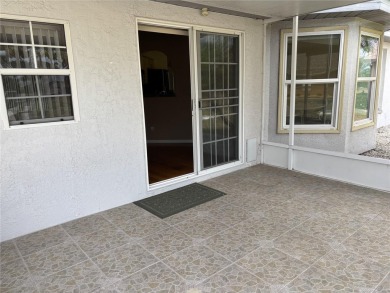 Welcome to a lovely home situated on a large corner lot in the on Caloosa Greens Executive Golf Course in Florida - for sale on GolfHomes.com, golf home, golf lot