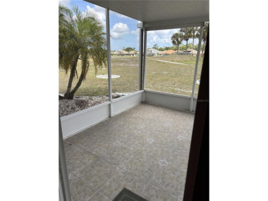 Welcome to a lovely home situated on a large corner lot in the on Caloosa Greens Executive Golf Course in Florida - for sale on GolfHomes.com, golf home, golf lot