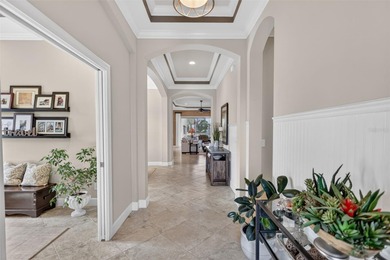 Experience elevated Florida living in this elegantly upgraded on Esplanade Golf and Country at Lakewood Ranch in Florida - for sale on GolfHomes.com, golf home, golf lot