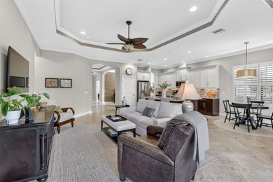 Experience elevated Florida living in this elegantly upgraded on Esplanade Golf and Country at Lakewood Ranch in Florida - for sale on GolfHomes.com, golf home, golf lot