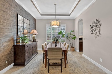 Experience elevated Florida living in this elegantly upgraded on Esplanade Golf and Country at Lakewood Ranch in Florida - for sale on GolfHomes.com, golf home, golf lot