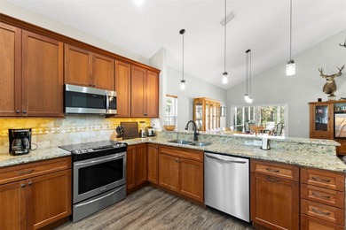 Welcome to an exceptional four-bedroom, two-and-a-half-bath pool on East Lake Woodlands Country Club in Florida - for sale on GolfHomes.com, golf home, golf lot