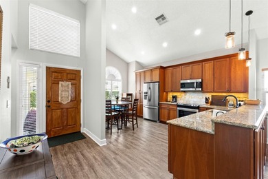 Welcome to an exceptional four-bedroom, two-and-a-half-bath pool on East Lake Woodlands Country Club in Florida - for sale on GolfHomes.com, golf home, golf lot