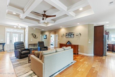 At 3220 Moss Hammock Wynd, craftsmanship and prestige unite in on Members Club At St. James Plantation in North Carolina - for sale on GolfHomes.com, golf home, golf lot