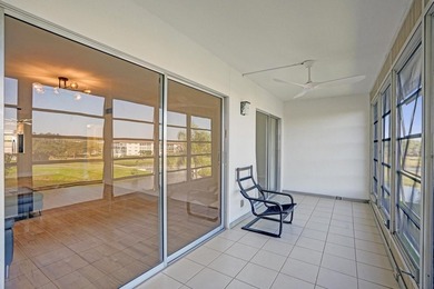 Discover this stunning top-floor 2-bed, 2-bath condo in the on Wynmoor Golf Course in Florida - for sale on GolfHomes.com, golf home, golf lot