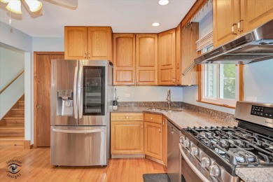 Tucked away on a peaceful, tree-lined street in coveted North on Downers Grove Golf Club in Illinois - for sale on GolfHomes.com, golf home, golf lot