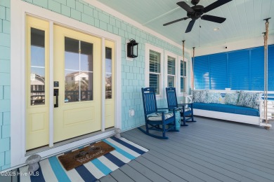 Charming Sunset Beach House custom built in 2023 is simply on Oyster Bay Golf Links in North Carolina - for sale on GolfHomes.com, golf home, golf lot