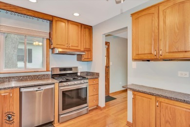 Tucked away on a peaceful, tree-lined street in coveted North on Downers Grove Golf Club in Illinois - for sale on GolfHomes.com, golf home, golf lot