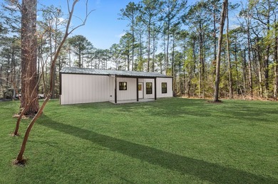 Discover modern East Texas living in this newly constructed on Rayburn Country Club in Texas - for sale on GolfHomes.com, golf home, golf lot