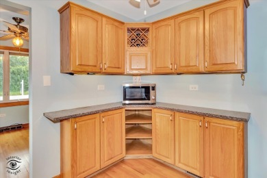 Tucked away on a peaceful, tree-lined street in coveted North on Downers Grove Golf Club in Illinois - for sale on GolfHomes.com, golf home, golf lot