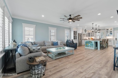 Charming Sunset Beach House custom built in 2023 is simply on Oyster Bay Golf Links in North Carolina - for sale on GolfHomes.com, golf home, golf lot